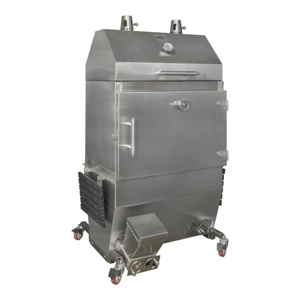 Large stainless-steel Rocket Outdoors smoker-baker with twin chimneys, front-mounted charcoal hopper, and red-wheeled casters shown on a black studio background.