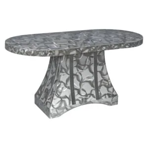 Oval dining table with brushed stainless steel top and sculpted pedestal base from Rocket Outdoors, on a white studio background.