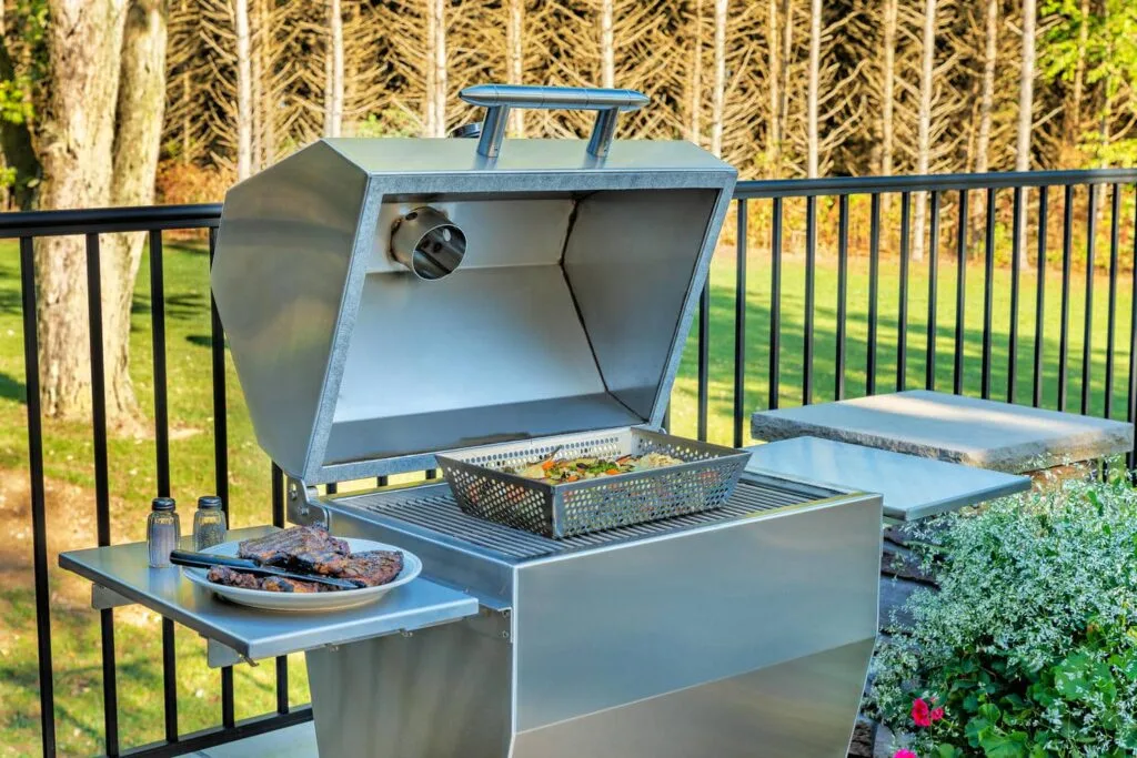Silver rocket charcoal grill open backyard patio