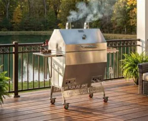 Silver Rocket Large Smoker on a Lakeside Deck in Autumn