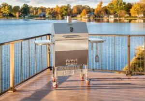 Silver Rocket Medium Grill on Lakeside Dock at Sunset