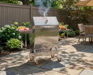 Silver Rocket Medium Grill Smoking on Flagstone Backyard Patio