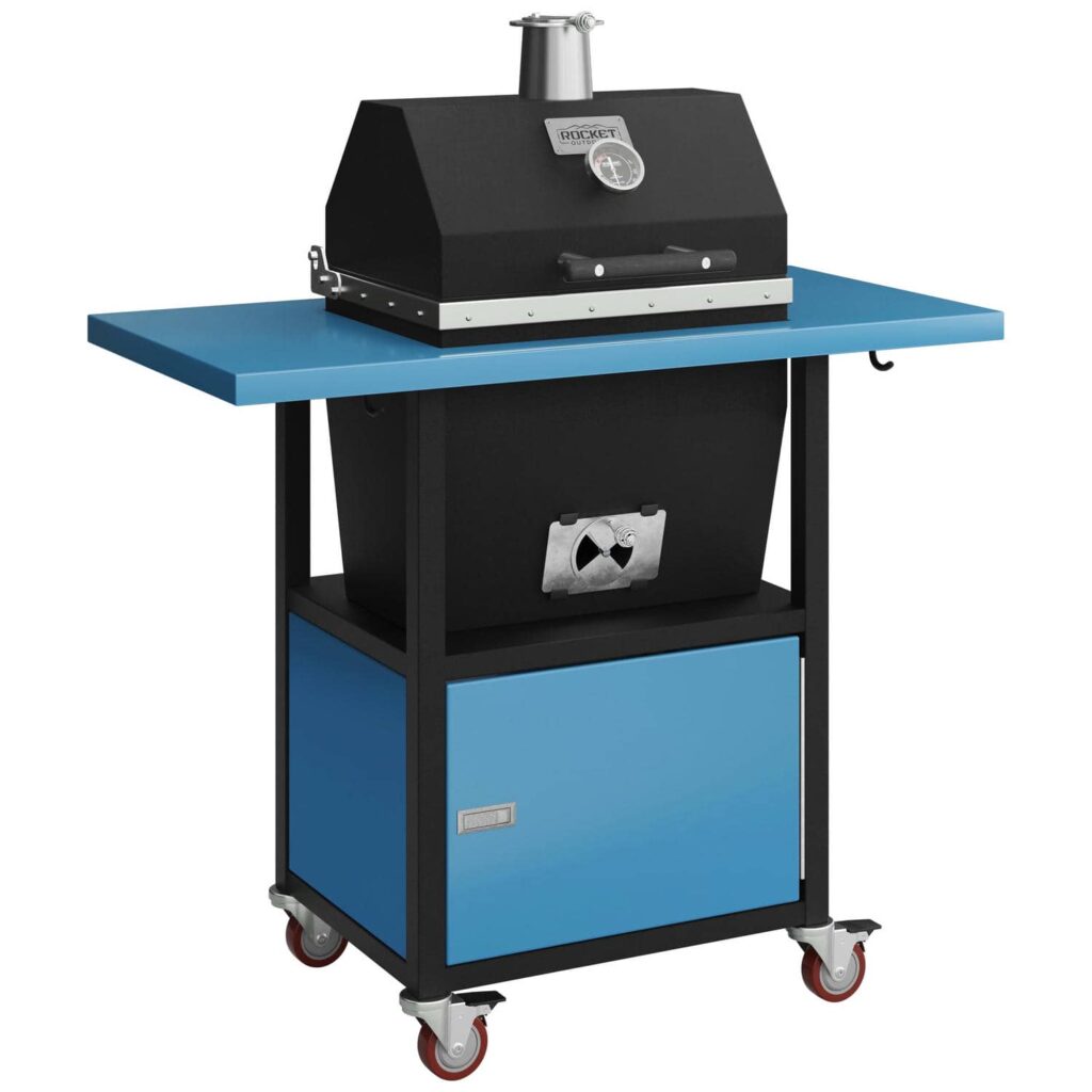 Sonic Rocket small cabinet charcoal smoker by Rocket Outdoors with light blue side shelf and lower storage door on locking caster wheels.