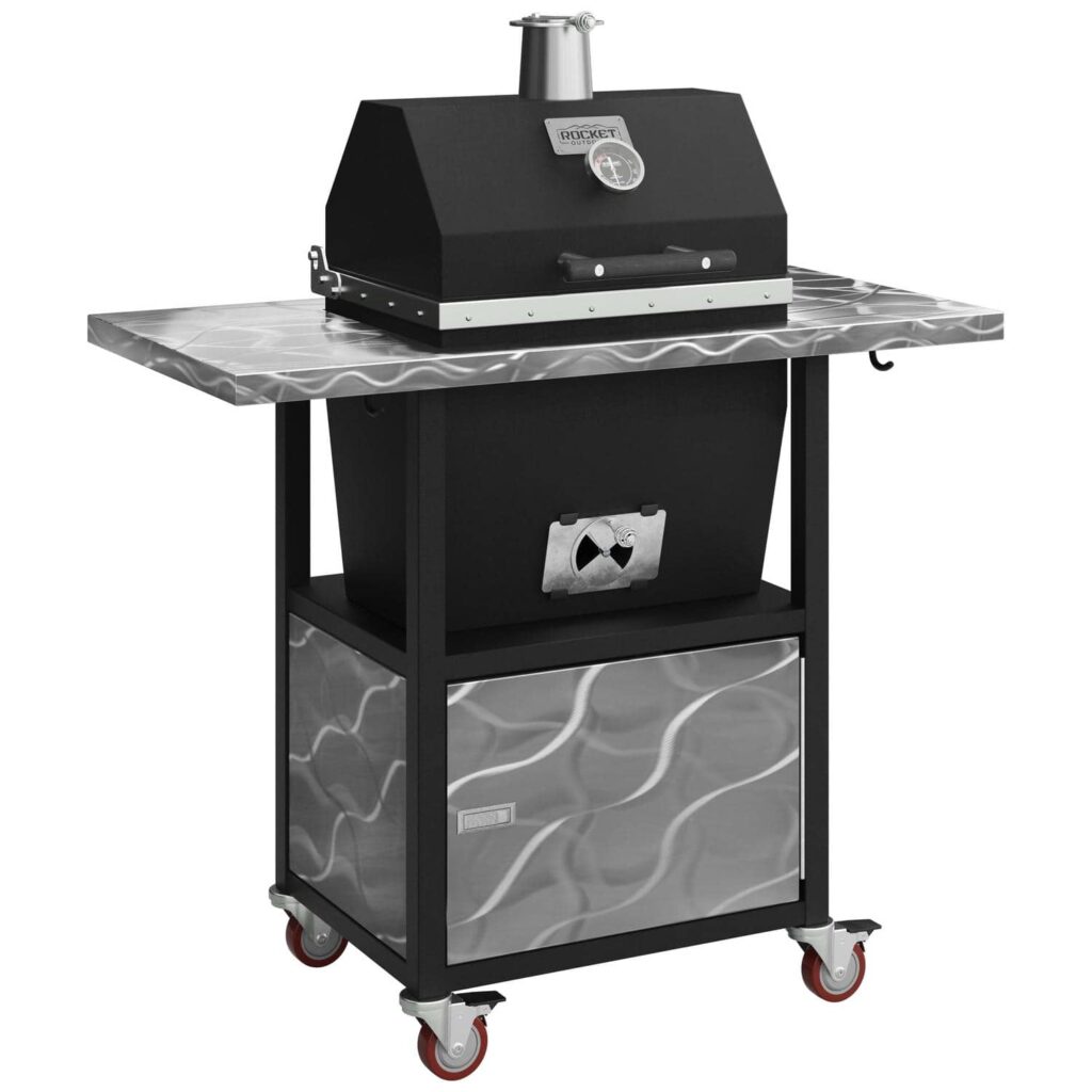 Sonic Rocket small cabinet charcoal smoker by Rocket Outdoors with swirled stainless steel side shelf and storage door on a textured black cart.